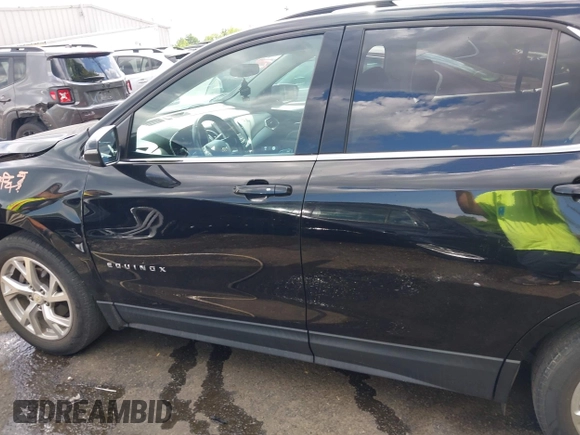 2019 Chevrolet Equinox LT z VIN 2GNAXKEV0K6247052, wystawiony jako IAAI lot #42192710 z przebiegiem 76 813 mil mil oraz . Historia ofert i sprzedaży dostępna na DreamBid. Obrazek 14.