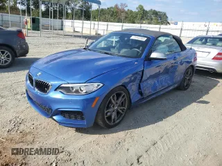 2015 BMW 2 Series M235i with VIN WBA1M1C53FV393104, listed as a Copart auction lot 71143703 with 12,025 mi miles. Bid and sale history available at carsss.com. Image 1.
