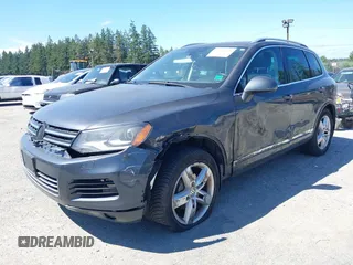 2012 Volkswagen Touareg Sport with VIN WVGFK9BP0CD004951, listed as a IAAI auction lot 42724125 with 173,993 mi miles and . Bid and sale history available at DreamBid. Image 17.