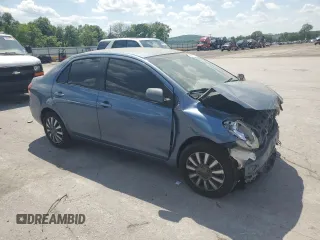 2009 Toyota Yaris with VIN JTDBT903191331207, listed as a Copart auction lot 54570165 with 232,601 mi miles and Salvage Title. Bid and sale history available at DreamBid. Image 4.