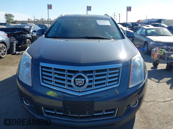 2013 Cadillac SRX Premium Collection z VIN 3GYFNEE37DS525612, wystawiony jako IAAI lot #41344221 z przebiegiem 119 573 mil mil oraz . Historia ofert i sprzedaży dostępna na DreamBid. Obrazek 13.