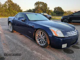 2004 Cadillac XLR z VIN 1G6YV34A945601993, wystawiony jako Copart lot #75136134 z przebiegiem Nie podano mil oraz Nie do naprawy. Historia ofert i sprzedaży dostępna na DreamBid. Obrazek 4.