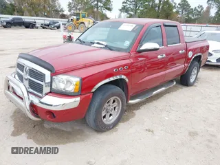 2006 Dodge Dakota SLT with VIN 1D7HE48K26S511004, listed as a IAAI auction lot 41344188 with 208,273 mi miles and . Bid and sale history available at DreamBid. Image 2.