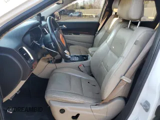 2014 Dodge Durango Citadel with VIN 1C4SDJET0EC391064, listed as a Copart auction lot 86631634 with 147,252 mi miles and Salvage Title. Bid and sale history available at DreamBid. Image 7.