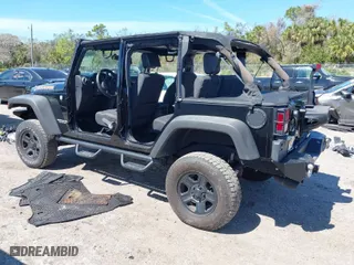 2010 Jeep Wrangler Unlimited Sport with VIN 1J4BA3H19AL229369, listed as a IAAI auction lot 41699172 with 125,021 mi miles. Bid and sale history available at carsss.com. Image 3.