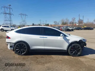 2018 Tesla Model X 75D with VIN 5YJXCAE45JF103828, listed as a IAAI auction lot 41698708 with 118,699 mi miles and . Bid and sale history available at carsss.com. Image 12.