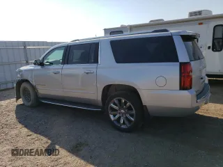 2017 Chevrolet Suburban Premier with VIN 1GNSKJKC4HR316953, listed as a Copart auction lot 76944884 with 105,753 mi miles and Salvage Title. Bid and sale history available at DreamBid. Image 2.