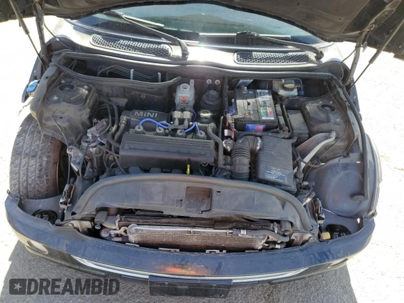 2004 MINI Hardtop with VIN WMWRC33464TJ62893, listed as a Copart auction lot 51905565 with 141,958 mi miles and Salvage Title. Bid and sale history available at DreamBid. Image 11.