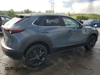 2022 Mazda CX-30 S Carbon Edition z VIN 3MVDMBCLXNM450913, wystawiony jako Copart lot #58537815 z przebiegiem 22 756 mil mil oraz Szkoda całkowita • Salvage title. Historia ofert i sprzedaży dostępna na DreamBid. Obrazek 3.