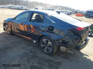 2016 Honda Civic Sedan EX-T with VIN 19XFC1F3XGE216013, listed as a IAAI auction lot 41765239 with 76,620 mi miles. Bid and sale history available at carsss.com. Image 3.