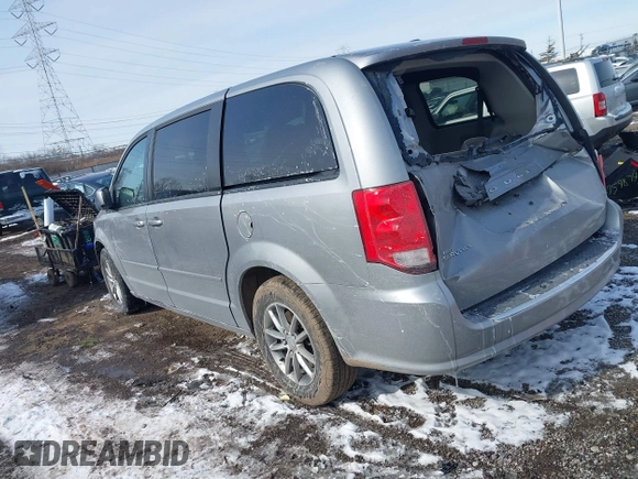 2015 Dodge Grand Caravan SE with VIN 2C4RDGBG3FR653239, listed as a IAAI auction lot 41607222 with 124,732 mi miles and . Bid and sale history available at DreamBid. Image 3.