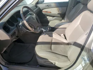 2003 Acura RL w/Navigation System with VIN JH4KA96653C001216, listed as a Copart auction lot 75018234 with 156,915 mi miles and Salvage Title. Bid and sale history available at carsss.com. Image 7.