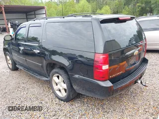 2007 Chevrolet Suburban LT with VIN 3GNFC16J87G228803, listed as a IAAI auction lot 41910240 with 303,191 mi miles and . Bid and sale history available at DreamBid. Image 3.
