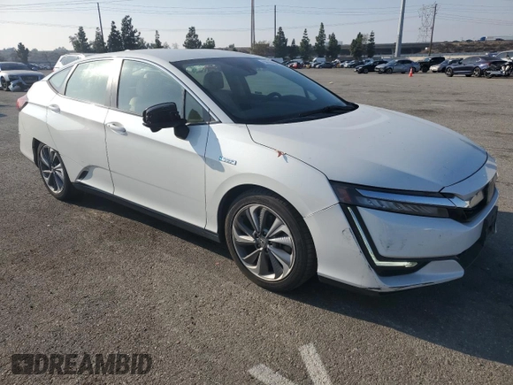2019 Honda Clarity Plug-In Hybrid with VIN JHMZC5F10KC001340, listed as a Copart auction lot 83696954 with 141,062 mi miles and Salvage Title. Bid and sale history available at carsss.com. Image 4.