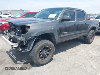 2010 Toyota Tacoma PreRunner with VIN 3TMJU4GN9AM097599, listed as a IAAI auction lot 42153344 with 213,063 mi miles and . Bid and sale history available at DreamBid. Image 2.