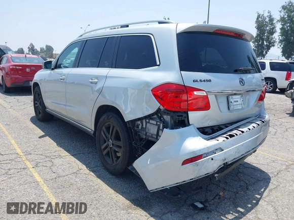 2014 Mercedes-Benz GL 450 z VIN 4JGDF7CE9EA411572, wystawiony jako IAAI lot #42461631 z przebiegiem 121 885 mil mil oraz . Historia ofert i sprzedaży dostępna na DreamBid. Obrazek 6.
