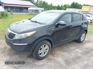 2011 Kia Sportage LX with VIN KNDPBCA27B7081079, listed as a IAAI auction lot 42692993 with 517,338 mi miles and . Bid and sale history available at DreamBid. Image 2.