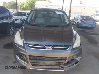 2015 Ford Escape Titanium with VIN 1FMCU0J92FUA20469, listed as a IAAI auction lot 42510293 with 161,466 mi miles and . Bid and sale history available at DreamBid. Image 13.