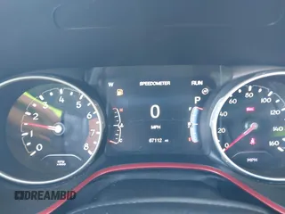 2020 Jeep Compass Trailhawk with VIN 3C4NJDDB4LT144129, listed as a IAAI auction lot 42582688 with 67,112 mi miles and . Bid and sale history available at DreamBid. Image 7.