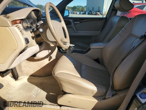 1998 Mercedes-Benz E 320 with VIN WDBJF25F3WA578364, listed as a Copart auction lot 77551834 with 228,913 mi miles and Salvage Title. Bid and sale history available at DreamBid. Image 7.