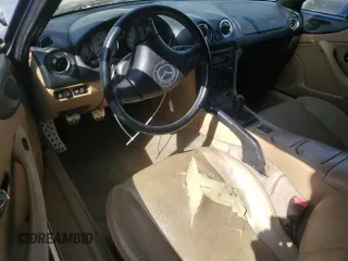 2002 Mazda MX-5 Miata Cloth z VIN JM1NB353220222868, wystawiony jako Copart lot #59944345 z przebiegiem 159 595 mil mil oraz Szkoda całkowita • Salvage title. Historia ofert i sprzedaży dostępna na DreamBid. Obrazek 8.