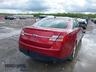 2018 Ford Taurus SEL z VIN 1FAHP2E85JG124997, wystawiony jako IAAI lot #42194985 z przebiegiem 86 456 mil mil oraz . Historia ofert i sprzedaży dostępna na DreamBid. Obrazek 4.