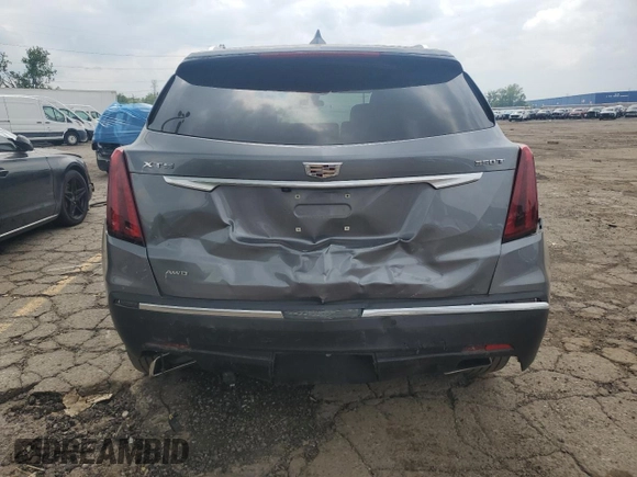 2021 Cadillac XT5 AWD Luxury with VIN 1GYKNBR49MZ221393, listed as a Copart auction lot 59322505 with 33,892 mi miles and Salvage title. Bid and sale history available at DreamBid. Image 6.