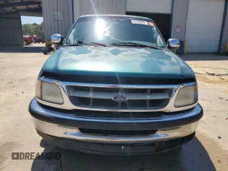 1998 Ford F-150 z VIN 1FTZX1768WNB23317, wystawiony jako Copart lot #52336895 z przebiegiem 288 431 mil mil oraz Szkoda całkowita • Salvage title. Historia ofert i sprzedaży dostępna na DreamBid. Obrazek 5.