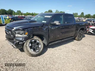 2021 Ram 1500 Rebel with VIN 1C6SRFLT5MN749481, listed as a Copart auction lot 65404205 with 24,115 mi miles and Salvage title. Bid and sale history available at DreamBid. Image 1.