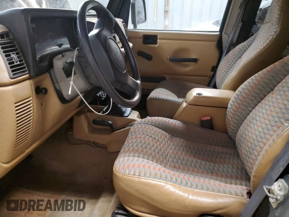 1997 Jeep Wrangler SE with VIN 1J4FY29PXVP476747, listed as a Copart auction lot 49218685 with 165,442 mi miles and Clean Title. Bid and sale history available at carsss.com. Image 7.