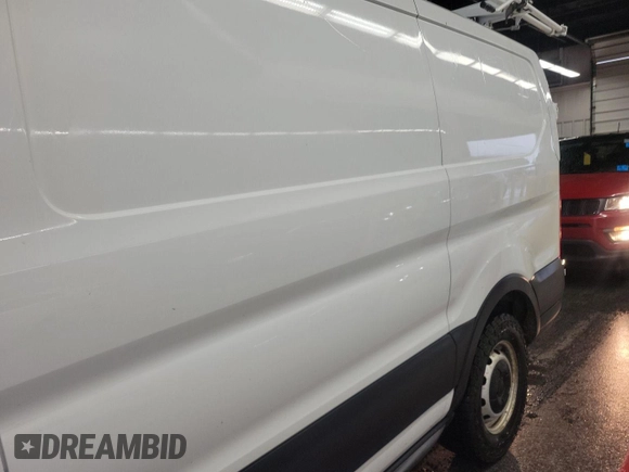 2019 Ford Transit with VIN 1FTYE1ZM6KKA31079, listed as a IAAI auction lot 42906716 with 169,160 mi miles and . Bid and sale history available at DreamBid. Image 2.