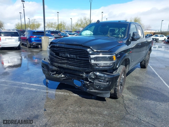 2022 Ram 2500 Laramie with VIN 3C6UR5FL2NG377414, listed as a IAAI auction lot 41492443 with 100,477 mi miles. Bid and sale history available at carsss.com. Image 2.