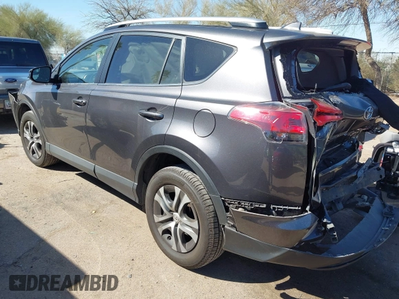 2016 Toyota RAV4 LE with VIN JTMBFREV4GJ052168, listed as a IAAI auction lot 41837564 with 73,659 mi miles. Bid and sale history available at carsss.com. Image 3.
