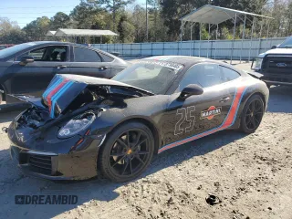 2018 Porsche 911 Carrera with VIN WP0AA2A91JS105520, listed as a Copart auction lot 87765465 with Not Provided miles and Salvage Title. Bid and sale history available at DreamBid. Image 1.