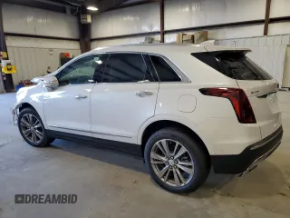 2025 Cadillac XT5 FWD Premium Luxury with VIN 1GYKNCRSXSZ106707, listed as a Copart auction lot 86919854 with 1,879 mi miles and Salvage Title. Bid and sale history available at DreamBid. Image 2.