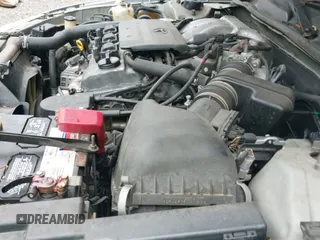 2001 Toyota Camry LE z VIN 4T1BF22K51U958185, wystawiony jako IAAI lot #42913557 z przebiegiem 141 066 mil mil oraz . Historia ofert i sprzedaży dostępna na DreamBid. Obrazek 19.