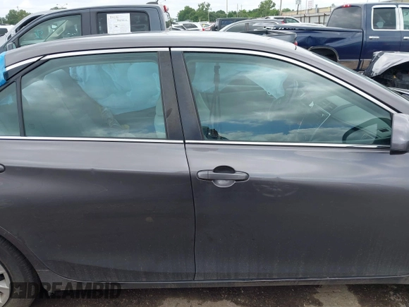 2015 Toyota Camry XLE with VIN 4T4BF1FK1FR446697, listed as a IAAI auction lot 42077763 with 119,278 mi miles and . Bid and sale history available at DreamBid. Image 13.