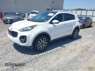 2017 Kia Sportage EX with VIN KNDPNCACXH7079500, listed as a IAAI auction lot 42051156 with 100,928 mi miles and . Bid and sale history available at DreamBid. Image 2.
