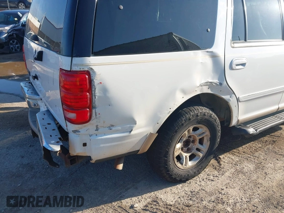 1999 Ford Expedition XLT with VIN 1FMRU1761XLA56030, listed as a IAAI auction lot 42703533 with Not provided miles and . Bid and sale history available at DreamBid. Image 13.