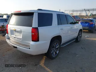 2016 Chevrolet Tahoe LTZ with VIN 1GNSKCKC9GR243895, listed as a IAAI auction lot 42322779 with 162,138 mi miles and . Bid and sale history available at DreamBid. Image 4.