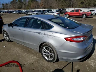 2016 Ford Fusion Titanium Hybrid with VIN 3FA6P0RU9GR387322, listed as a Copart auction lot 88020165 with 142,075 mi miles and Clean Title. Bid and sale history available at carsss.com. Image 2.