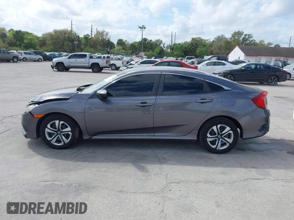 2018 Honda Civic Sedan LX with VIN 19XFC2F59JE044099, listed as a IAAI auction lot 41719337 with 44,534 mi miles. Bid and sale history available at carsss.com. Image 14.