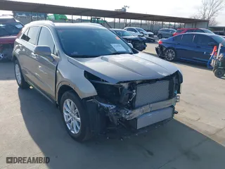 2023 Cadillac XT4 FWD Luxury with VIN 1GYAZAR41PF149914, listed as a IAAI auction lot 41709996 with 4,345 mi miles. Bid and sale history available at carsss.com. Image 1.