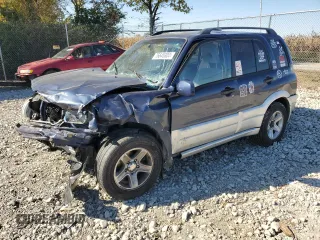 2003 Suzuki Grand Vitara z VIN JS3TD62V834106398, wystawiony jako Copart lot #76645304 z przebiegiem 205 001 mil mil oraz Szkody całkowita. Historia ofert i sprzedaży dostępna na DreamBid. Obrazek 1.