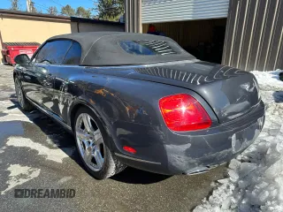 2010 Bentley Continental GT with VIN SCBDR3ZA9AC066604, listed as a Copart auction lot 46725805 with 59,156 mi miles and Salvage Title. Bid and sale history available at DreamBid. Image 3.