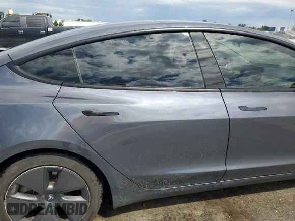 2023 Tesla Model 3 с VIN 5YJ3E1EA7PF449077, выставлен на аукционе Copart как лот 56821975 с пробегом 42 037 миль миль и Списание • Salvage title. История ставок и продаж доступна на DreamBid. Изображение 10.