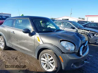 2013 MINI Paceman z VIN WMWSS1C52DWN46525, wystawiony jako IAAI lot #41643631 z przebiegiem 126 392 mil mil oraz . Historia ofert i sprzedaży dostępna na DreamBid. Obrazek 1.