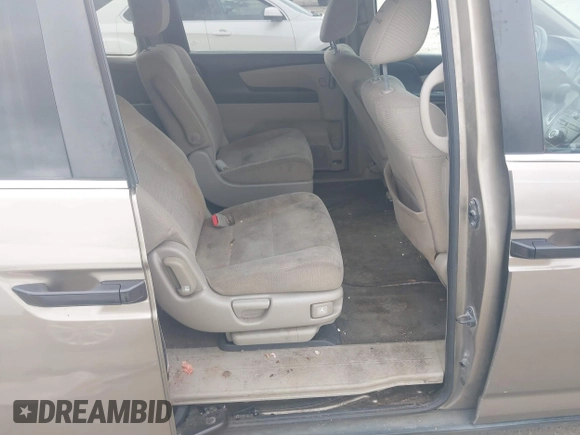 2012 Honda Odyssey LX z VIN 5FNRL5H25CB019912, wystawiony jako IAAI lot #41458224 z przebiegiem 158 980 mil mil oraz . Historia ofert i sprzedaży dostępna na DreamBid. Obrazek 8.