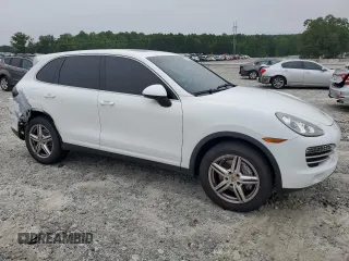 2014 Porsche Cayenne with VIN WP1AA2A21ELA95833, listed as a Copart auction lot 58572195 with 145,073 mi miles and Salvage title. Bid and sale history available at DreamBid. Image 4.