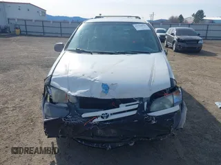 2001 Toyota Sienna LE with VIN 4T3ZF13C51U382556, listed as a IAAI auction lot 41744836 with 226,221 mi miles. Bid and sale history available at carsss.com. Image 11.